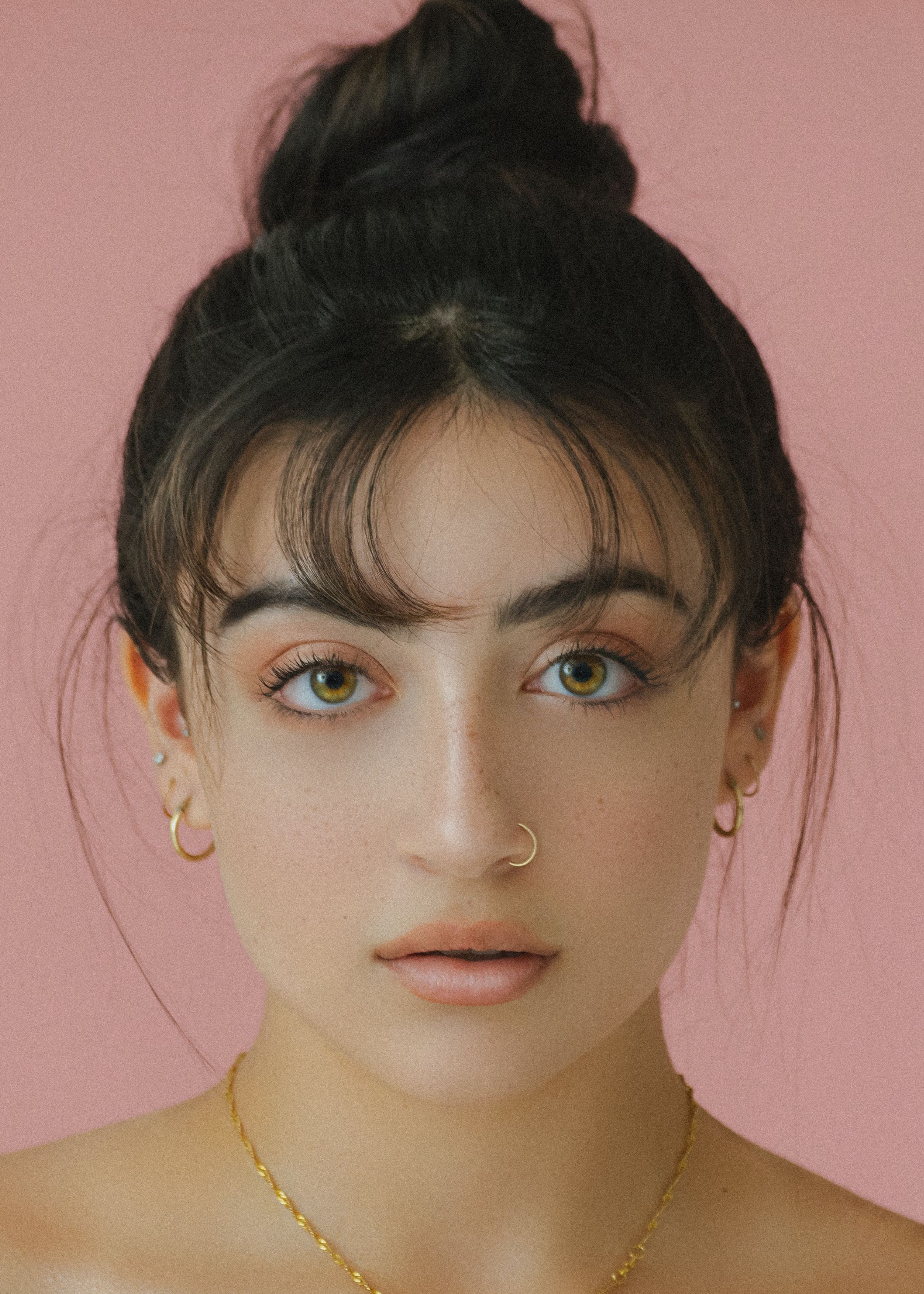 Sophia Rodriguez - A sophisticated New York City model radiating timeless beauty and charm.